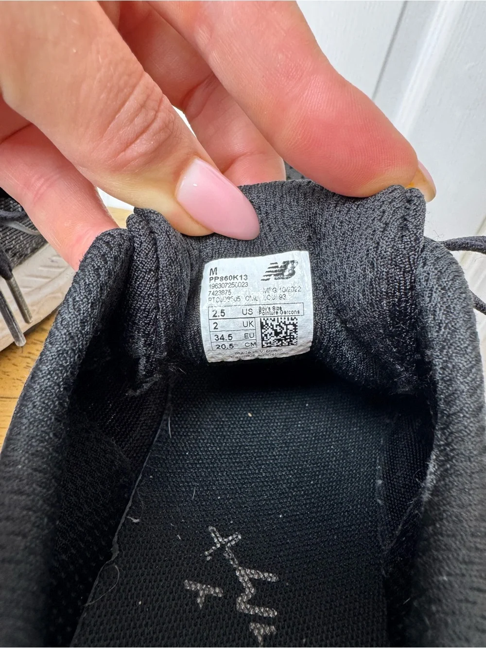 New Balance Black and White Running Sneakers